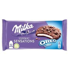 Milka Cookie Sensations - Ciastka kakaowe z kawałkami czekolady i nadzieniem o smaku waniliowym - 156 g